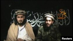 Taliban leader Hakimullah Mehsud (L) sits beside a man who is believed to be Humam Khalil Abu-Mulal Al-Balawi, the suicide bomber who killed CIA agents in Afghanistan, in this still image taken from video released January 9, 2010. A Pakistan television st