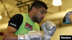 Amir khan, một trong nhiều đấu thủ chuyên nghiệp bày tỏ ước muốn tranh tài ở Olympic.