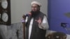 Hafiz Saeed, head of the Pakistani religious party, Jamaat-ud-Dawa, gives Friday sermon at a mosque in Lahore, Pakistan, Nov. 24, 2017. 