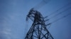 A high voltage power line tower is pictured after sunset in Sydney, Australia August 11, 2017. REUTERS/Jason Reed - RC1B8630BB90