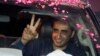 Bilawal Bhutto Zardari, leader of Pakistan Peoples Party, flashes victory sign to supporters during an election rally in Lahore, Pakistan, July 19, 2018. 